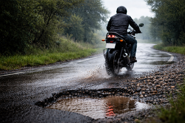 Spring Motorcycle Crashes in Oklahoma: How Rain, Gravel, and Potholes Affect Injury Claims